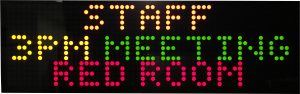 Display with multi-colored text and graphics: Staff Meeting.